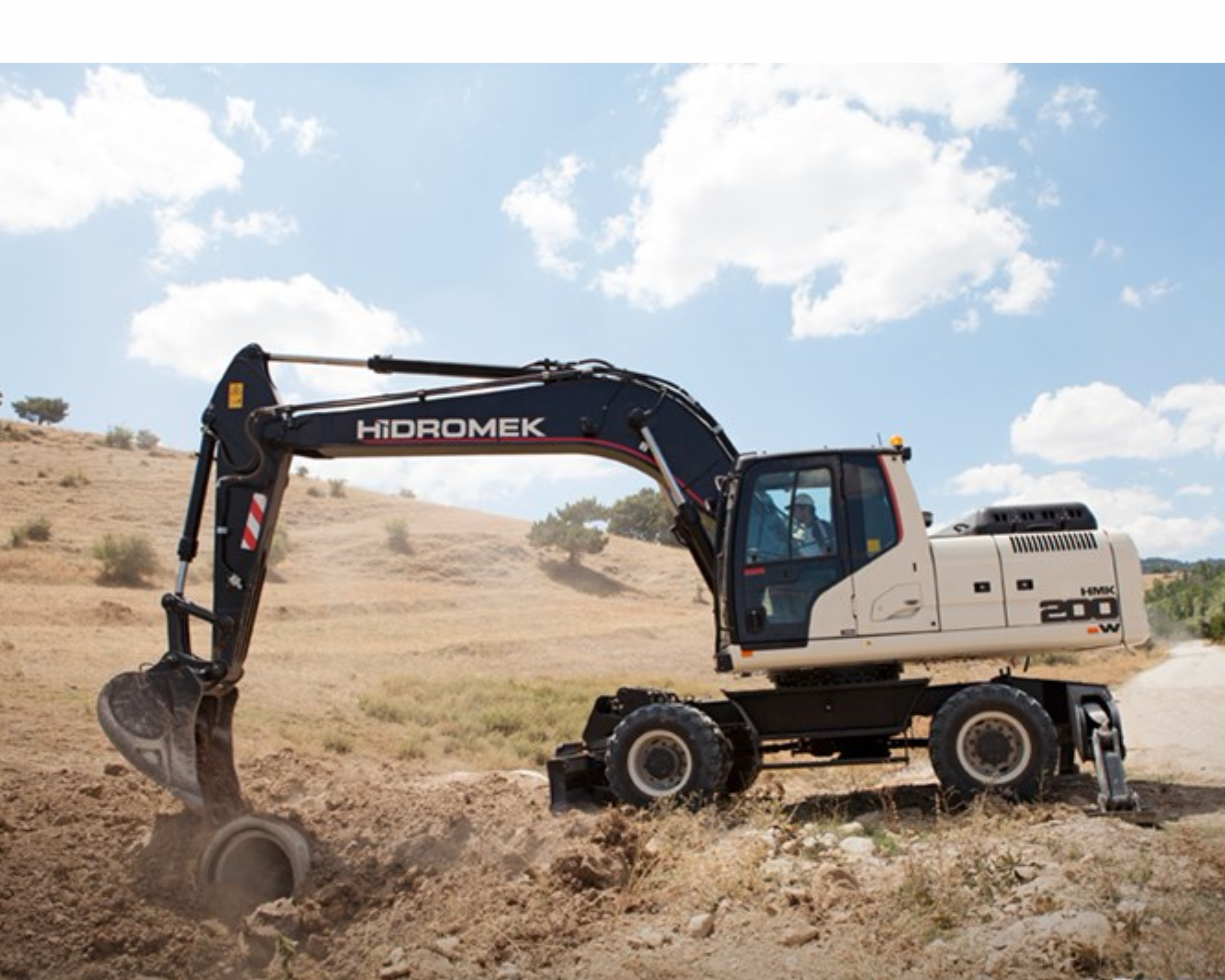 Pelles sur pneus hidromek